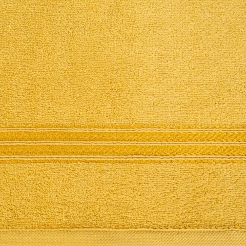 Ręcznik z żakardową bordiurą LORI 70x140 cm kolor musztardowy Ręcznik z żakardową bordiurą LORI 70x140 cm kolor musztardowy
